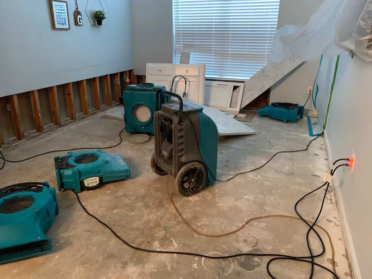 Dehumidifier in flood-cut room for Water Damage Restoration in Smithfield